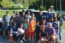 Cop on a neighborhood group of people