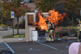 Fireman putting out fire