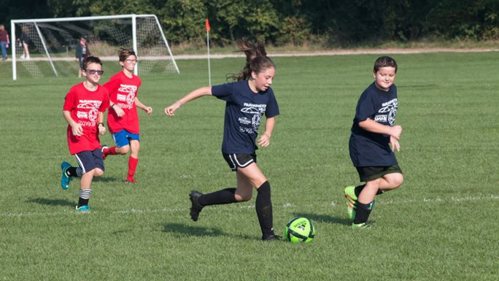 Kids playing soccer